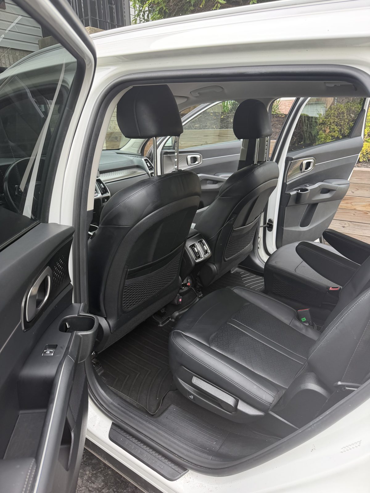 Kia Crossover second row left after