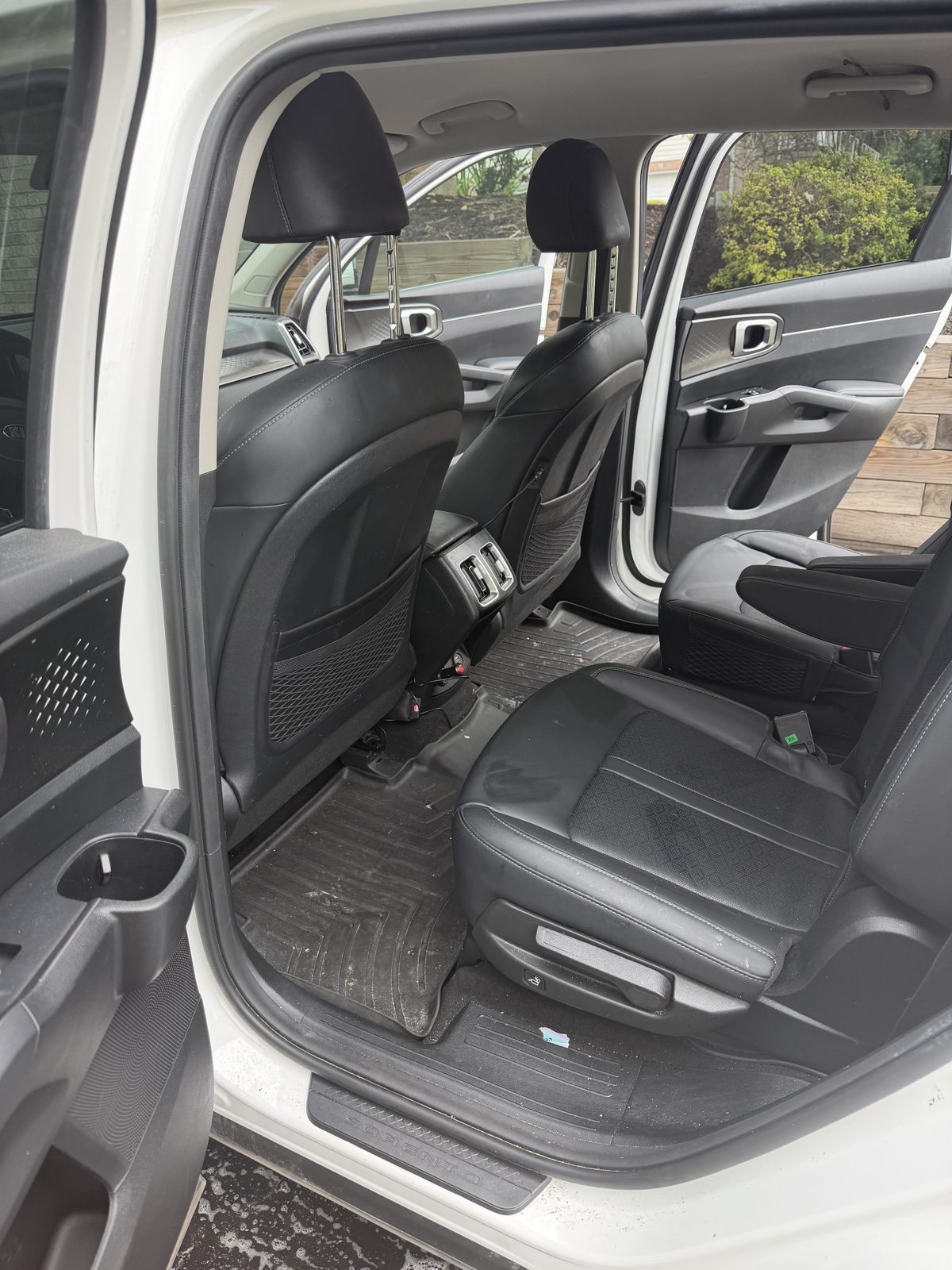 Kia Crossover second row left before
